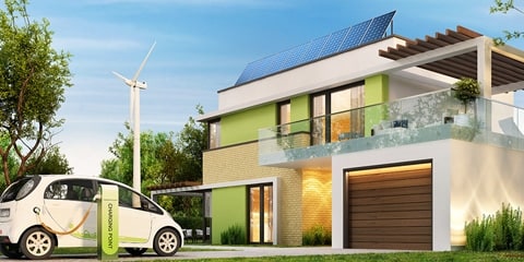 Image of an EV outside a futuristic looking house